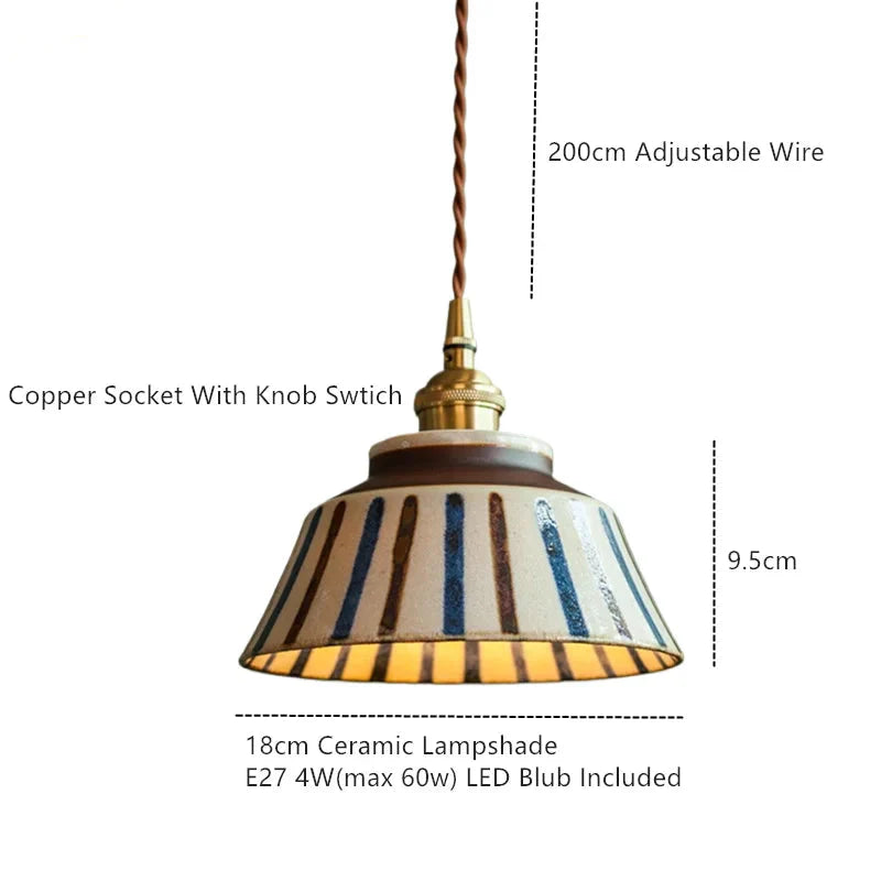 Ronja hand-painted blue floral ceramic pendant light hanging above a kitchen dining nook