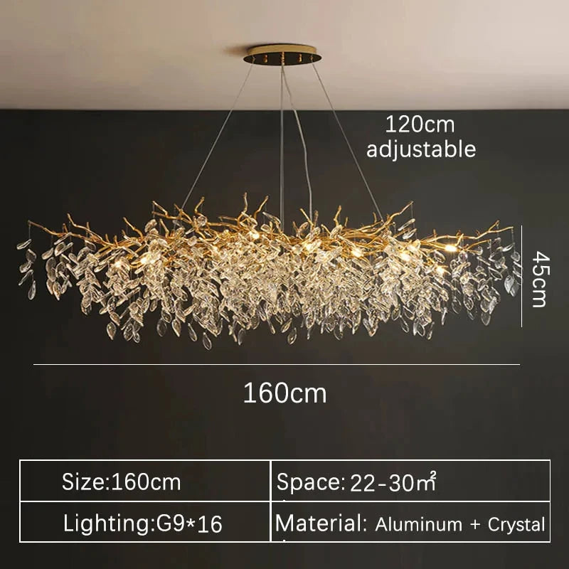 Aurelius brushed gold crystal LED chandelier hanging in a formal dining room