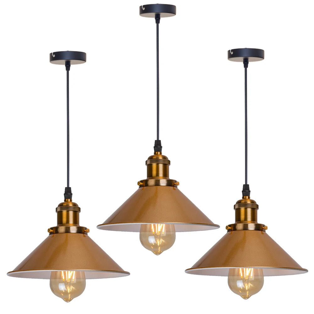 Camden vintage loft pendant light in black metal finish hanging above a kitchen dining table