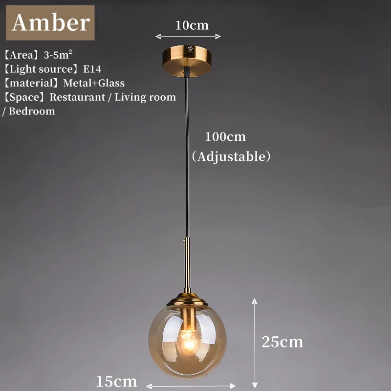 Orla amber glass and metal pendant light hanging above a bedside table in a Nordic-style bedroom