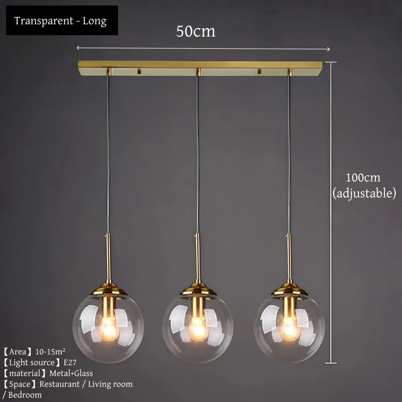Orla amber glass and metal pendant light hanging above a bedside table in a Nordic-style bedroom