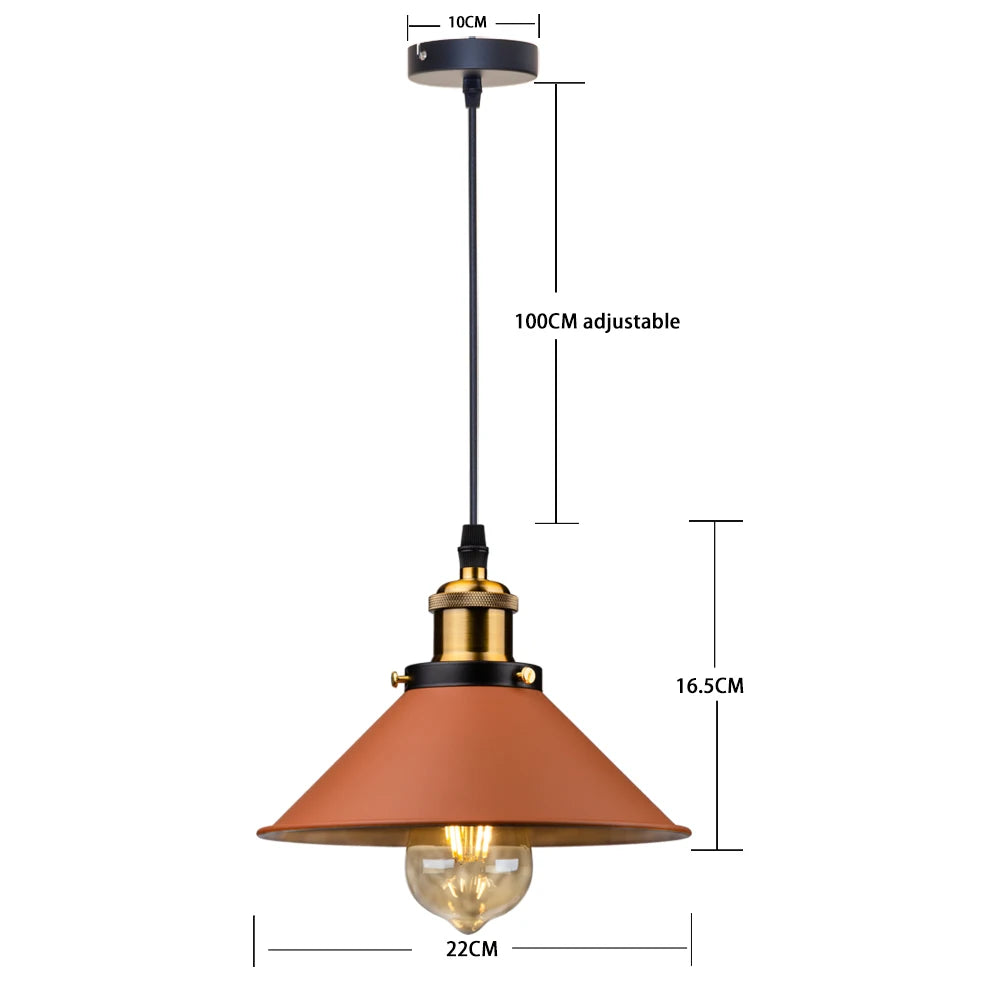Camden vintage loft pendant light in black metal finish hanging above a kitchen dining table