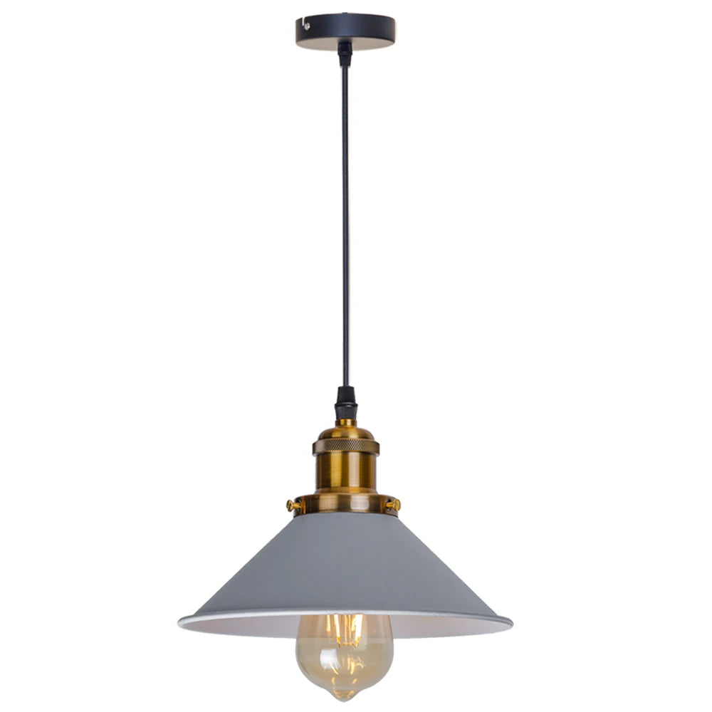 Camden vintage loft pendant light in black metal finish hanging above a kitchen dining table