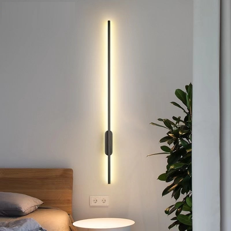Lisbon natural rattan pendant light hanging above a dining table in a Scandinavian-style interior