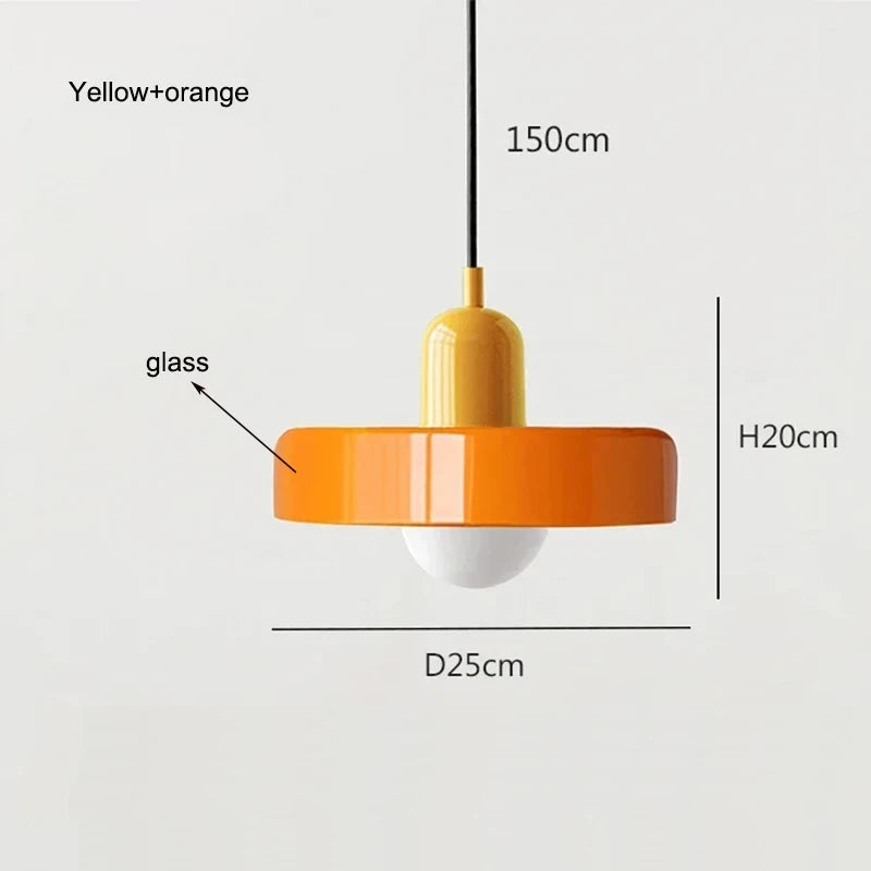 Bauhaus multi-pendant glass chandelier with orange shades hanging above a dining table in a café