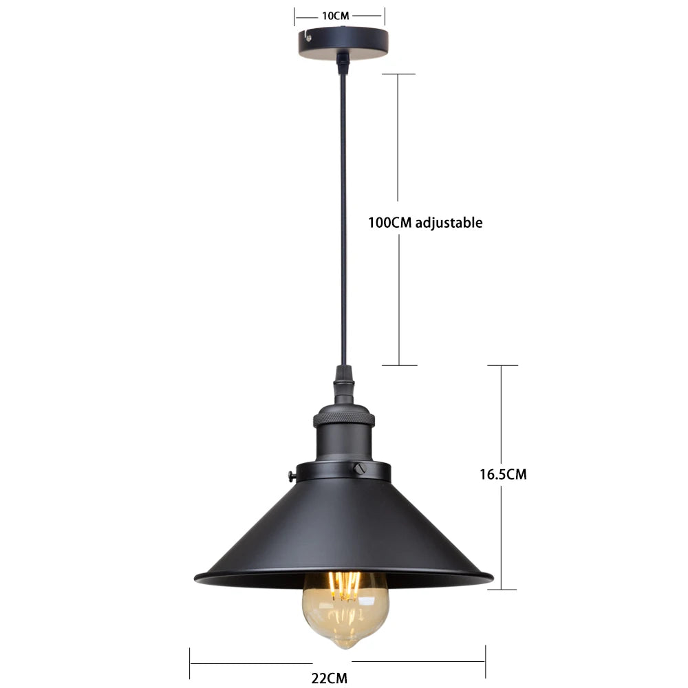 Camden vintage loft pendant light in black metal finish hanging above a kitchen dining table