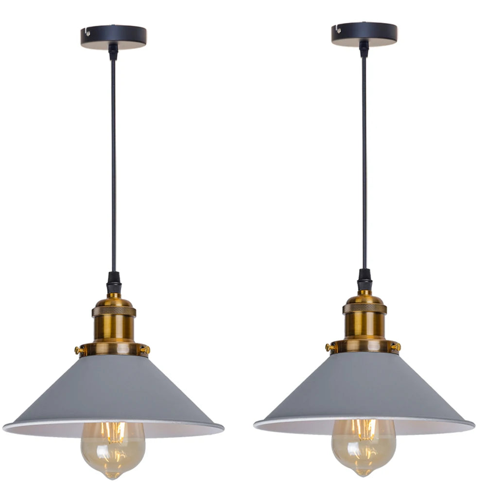 Camden vintage loft pendant light in black metal finish hanging above a kitchen dining table