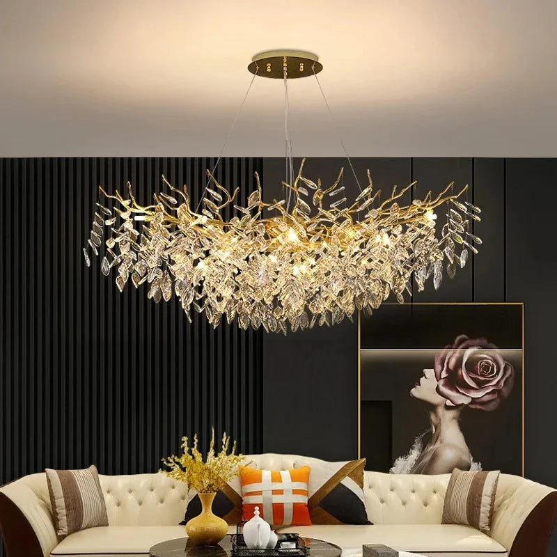 Aurelius brushed gold crystal LED chandelier hanging in a formal dining room