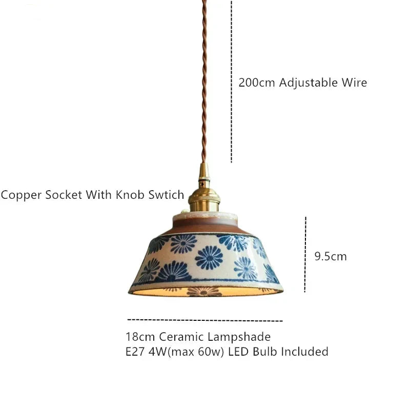 Ronja hand-painted blue floral ceramic pendant light hanging above a kitchen dining nook