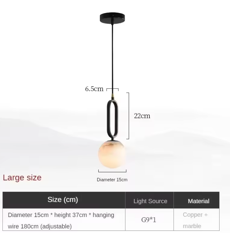 Hulda natural marble pendant light with copper accents above a formal dining table