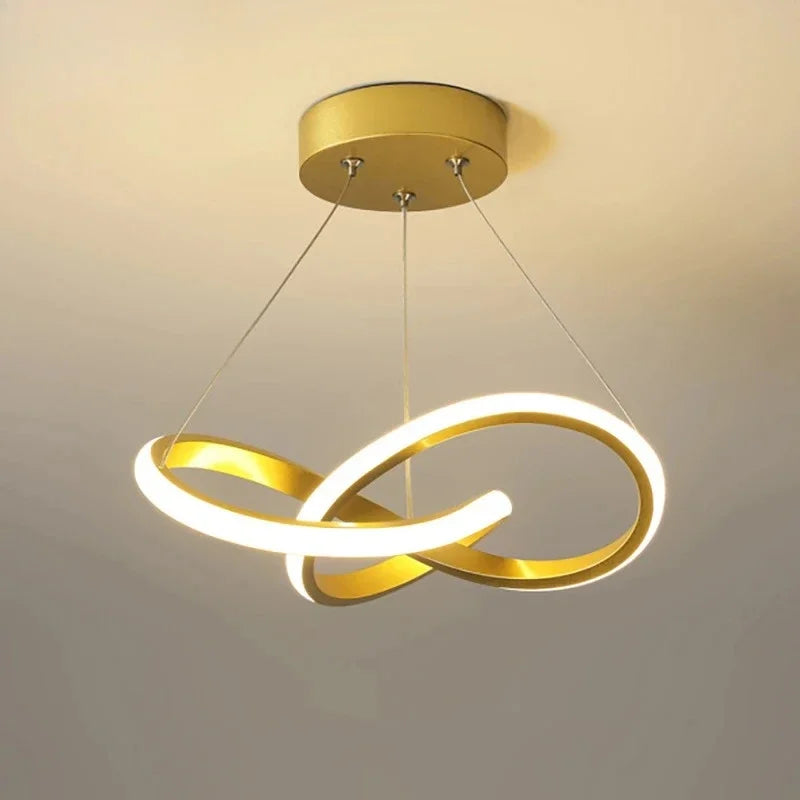 Strand slim Nordic LED ceiling pendant in white hanging in a dining room with low ceiling