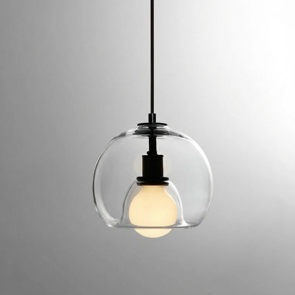 Anele smoke grey dome glass pendant light in a row of three above a kitchen island