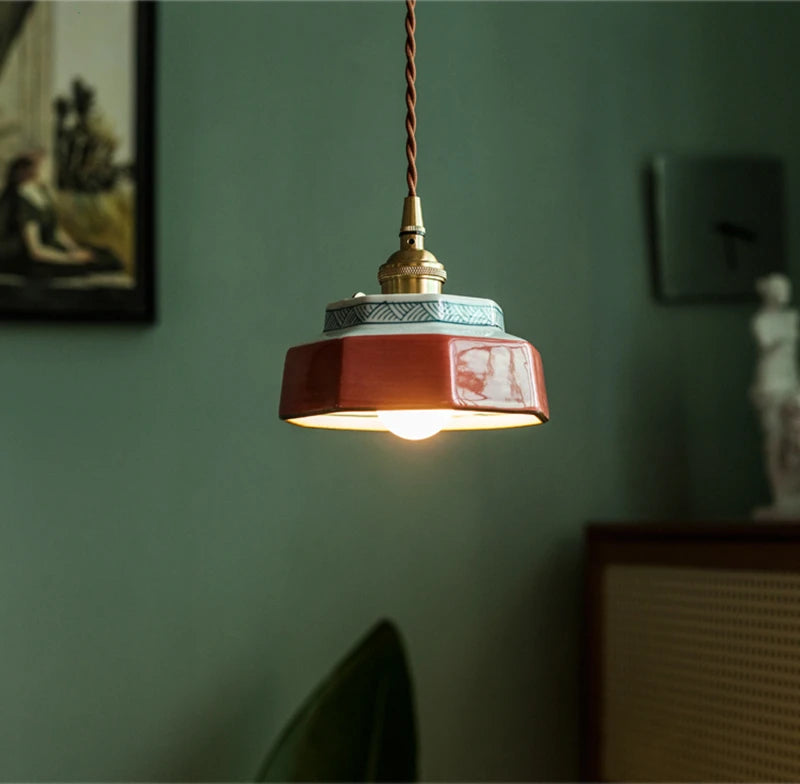 Sonja burnt clay hand-painted ceramic pendant light above a kitchen island