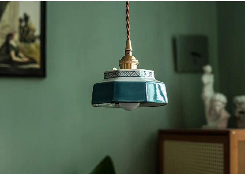 Sonja burnt clay hand-painted ceramic pendant light above a kitchen island