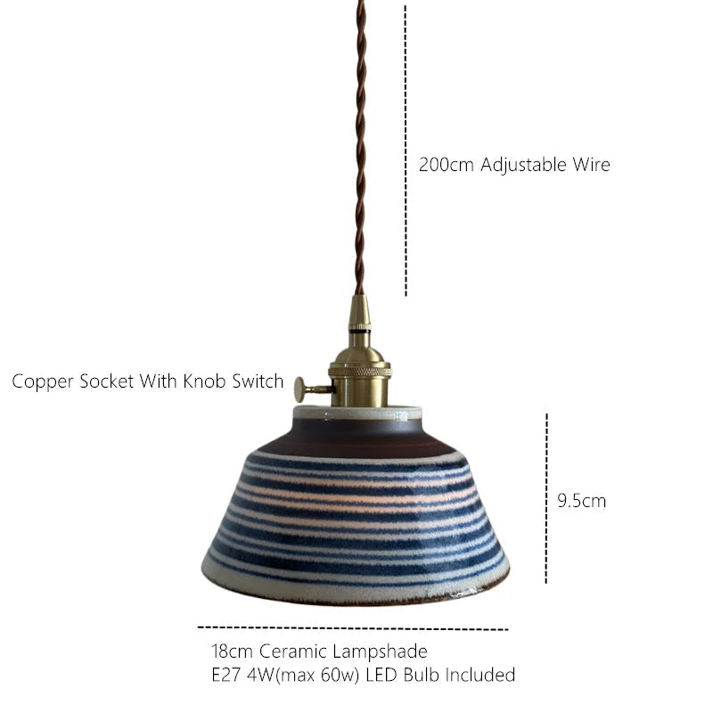 Ronja hand-painted blue floral ceramic pendant light hanging above a kitchen dining nook