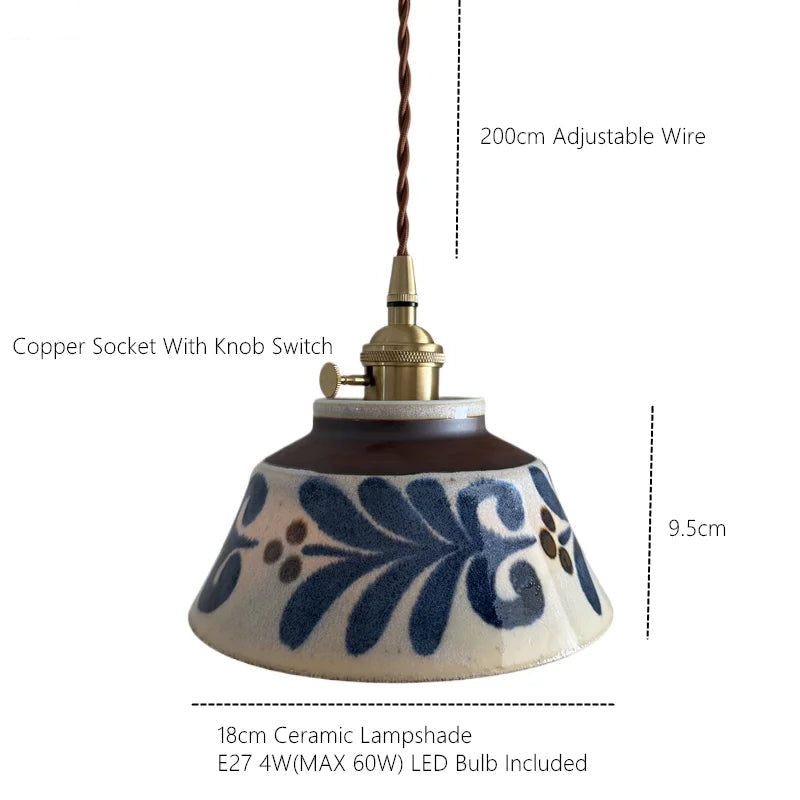 Ronja hand-painted blue floral ceramic pendant light hanging above a kitchen dining nook