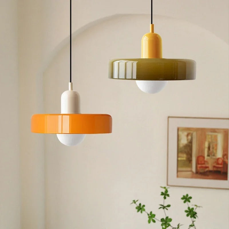 Kalle beige and white Bauhaus dual-tone glass pendant light hanging above a dining table