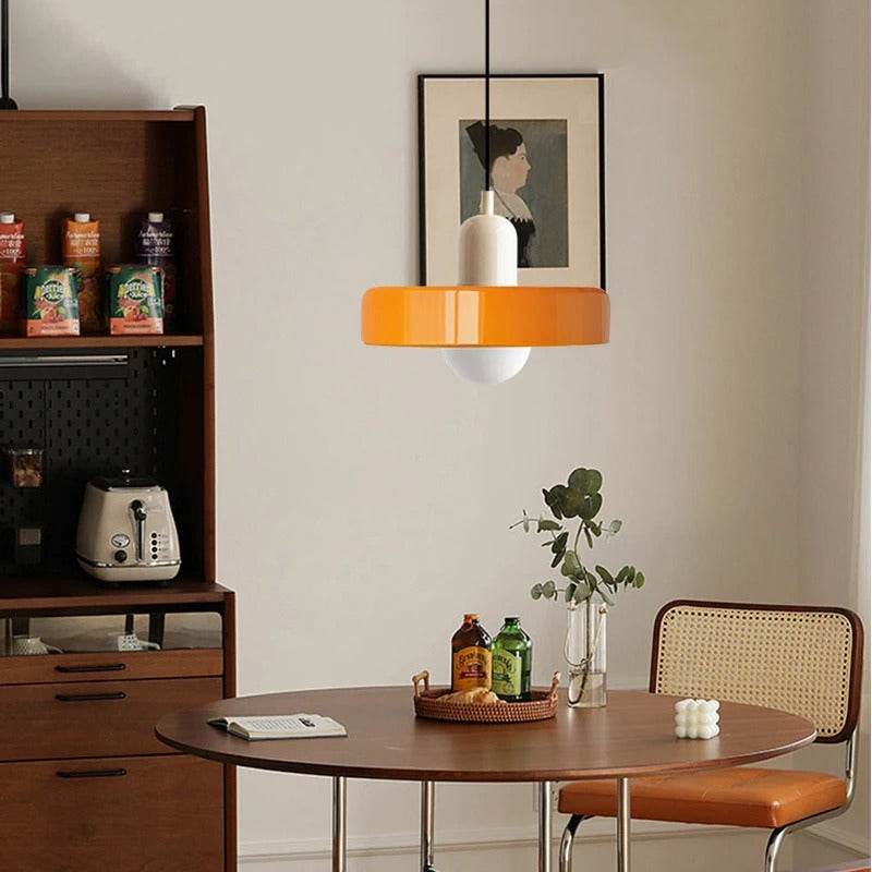 Kalle beige and white Bauhaus dual-tone glass pendant light hanging above a dining table