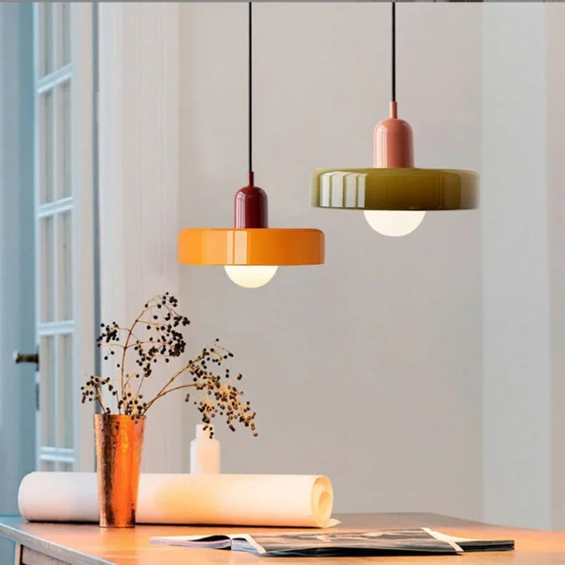 Kalle beige and white Bauhaus dual-tone glass pendant light hanging above a dining table